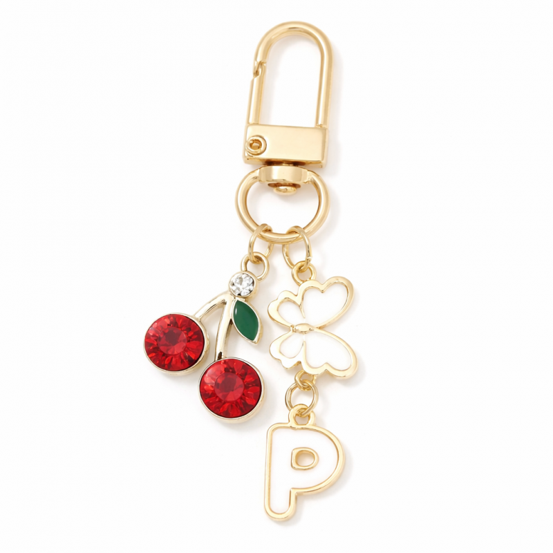 Brelok do kluczy LITERKA "P" 6,5cm WISIENKI, cyrkonie, złote z motylkiem BRL412P
